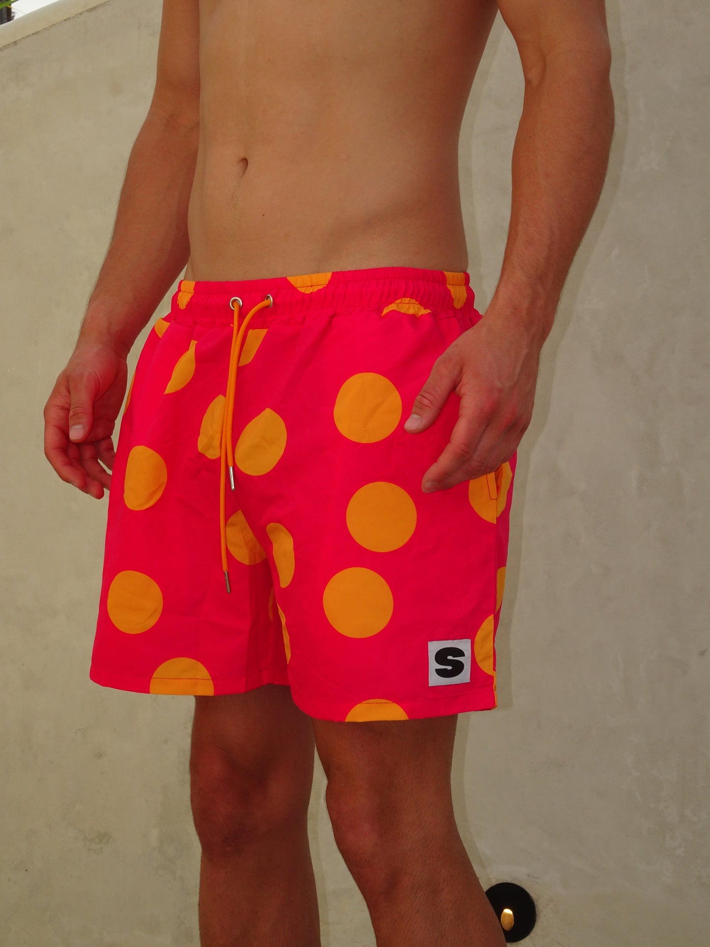PINK POLKADOTS SWIM SHORTS
