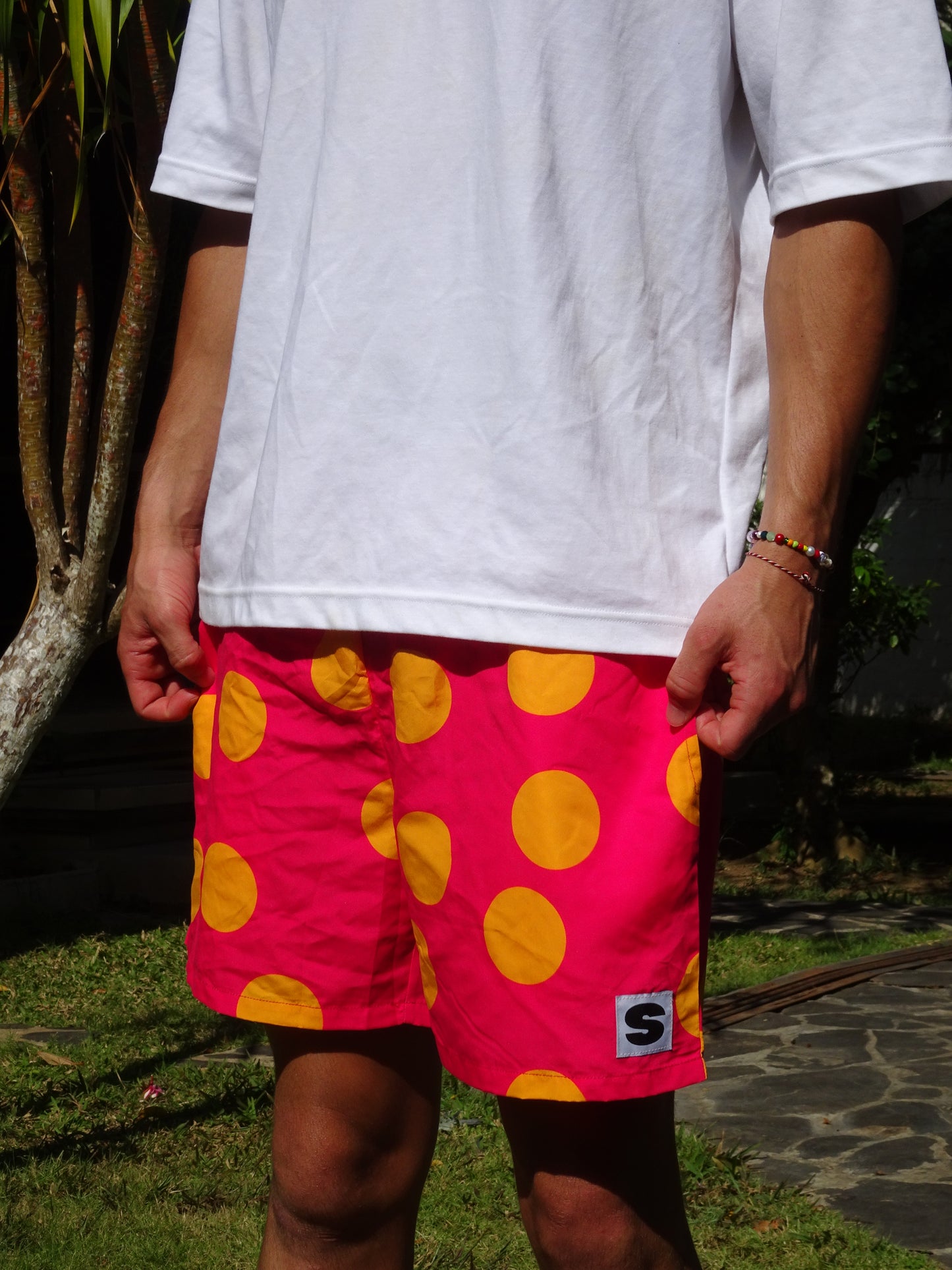 PINK POLKADOTS SWIM SHORTS