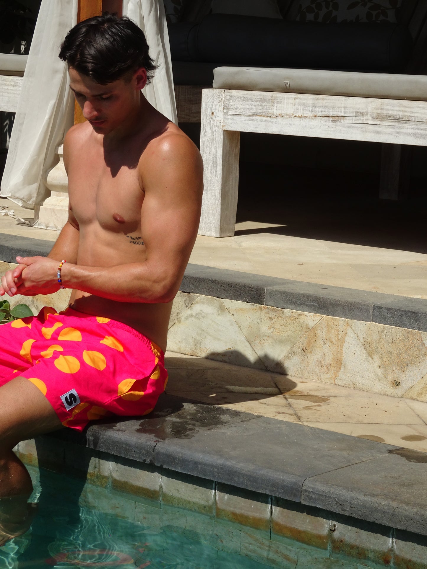 PINK POLKADOTS SWIM SHORTS